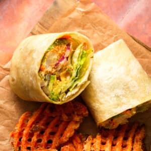 featured image of the buffalo cauliflower wrap sliced in half