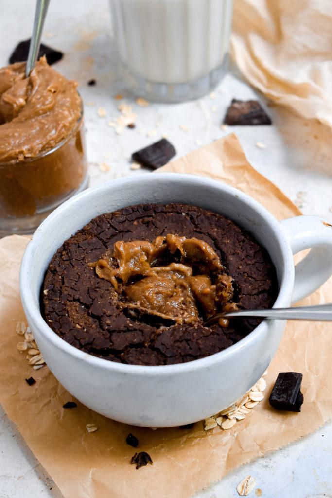 chocolate caramel baked oats recipe with the caramel filling dug into