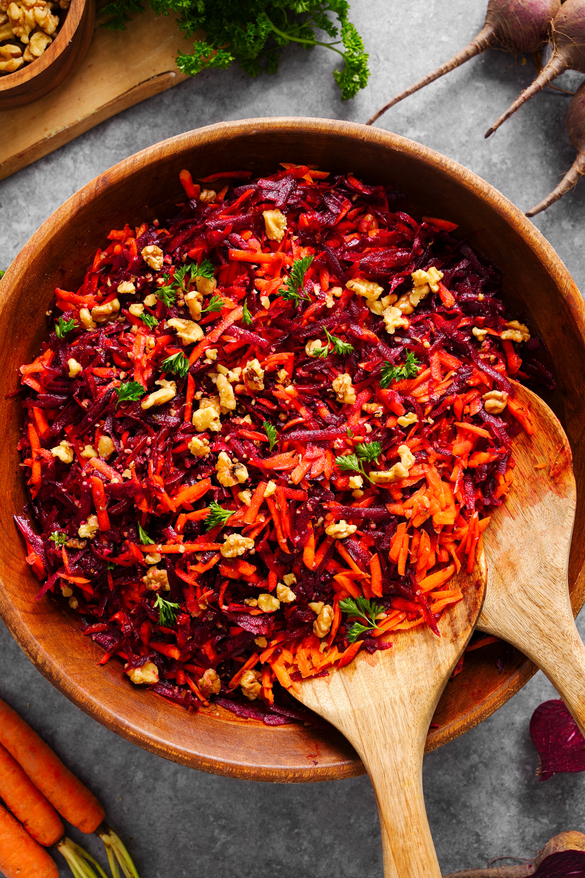 the beet carrot salad tossed in a large salad bowl.