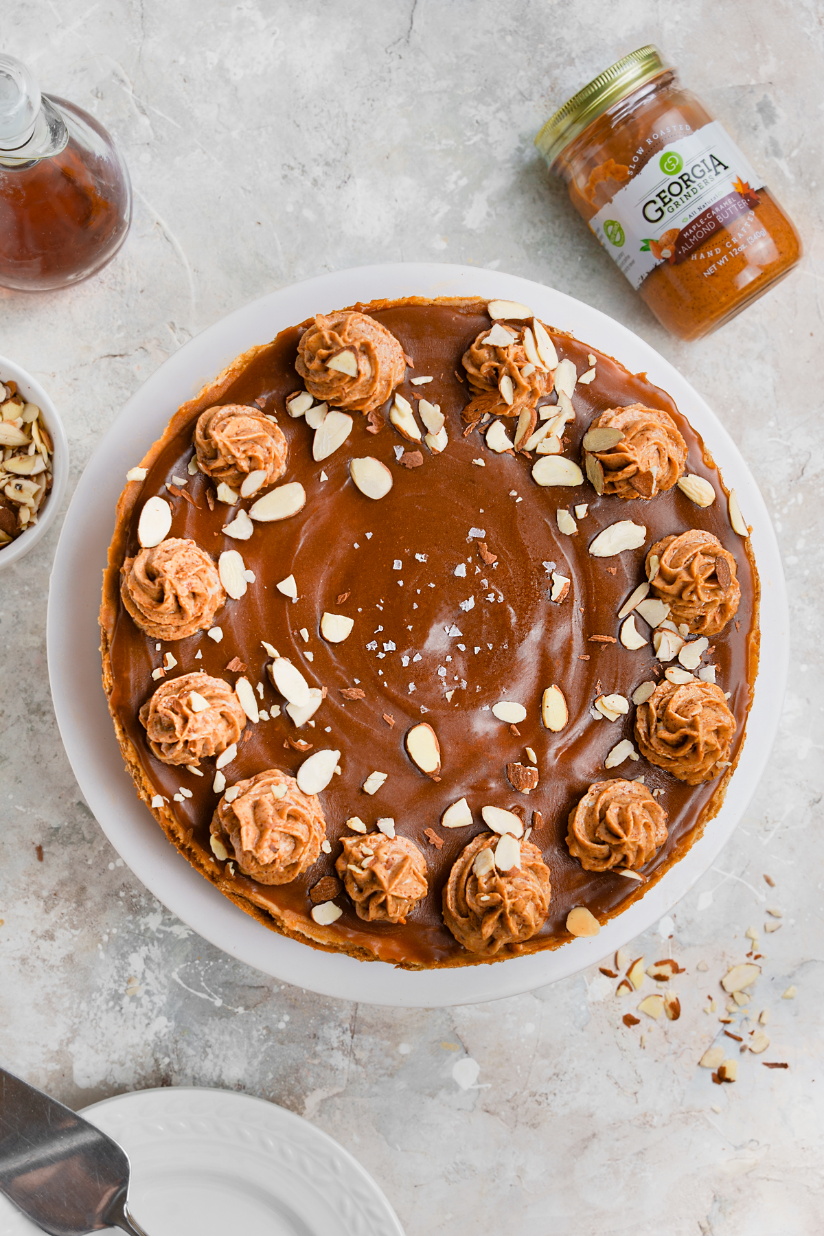 overhead shot of the whole healthy vegan cheesecake with the maple almond butter