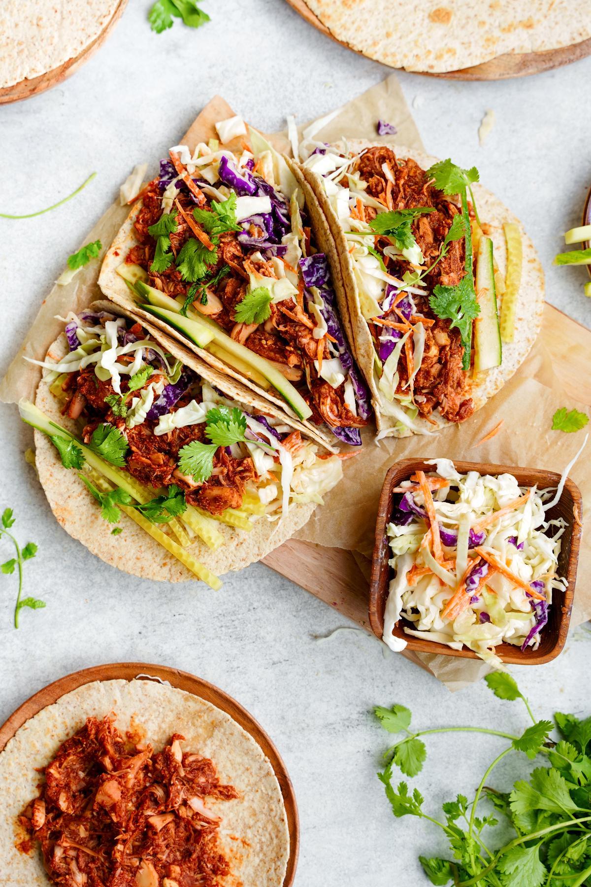 close up of the bbq jackfruit tacos with the healthy vegan coleslaw