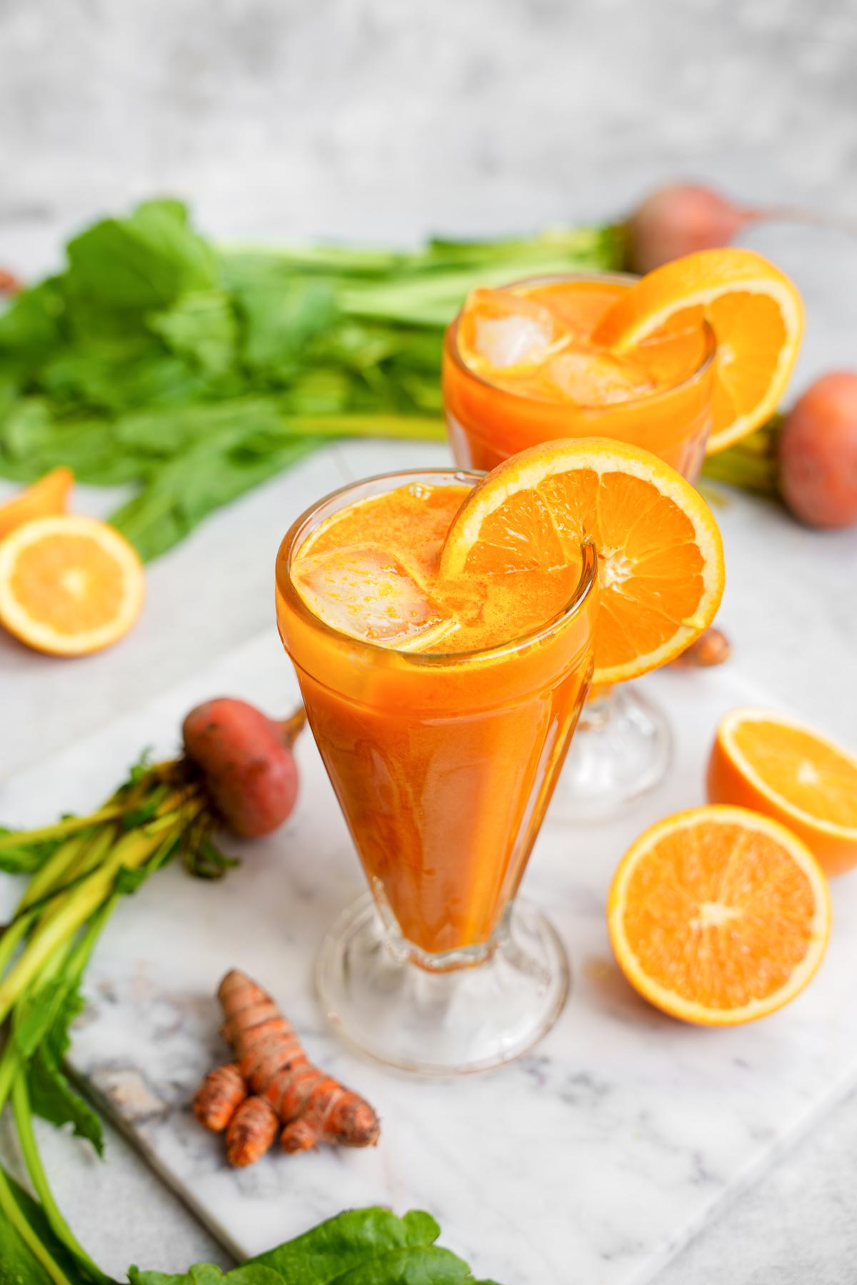 looking down at the glasses of cold pressed juice