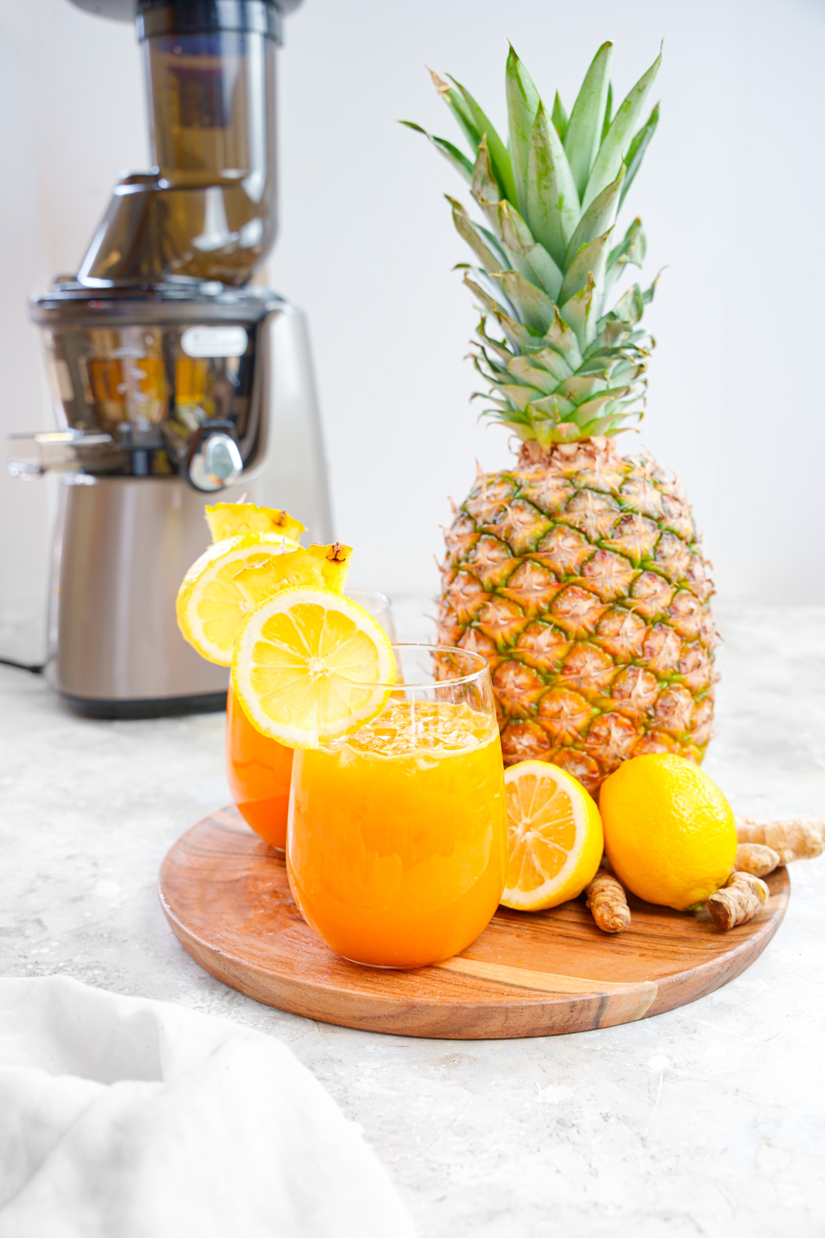 the pineapple turmeric ginger juice with the kuvings cold pressed juicer