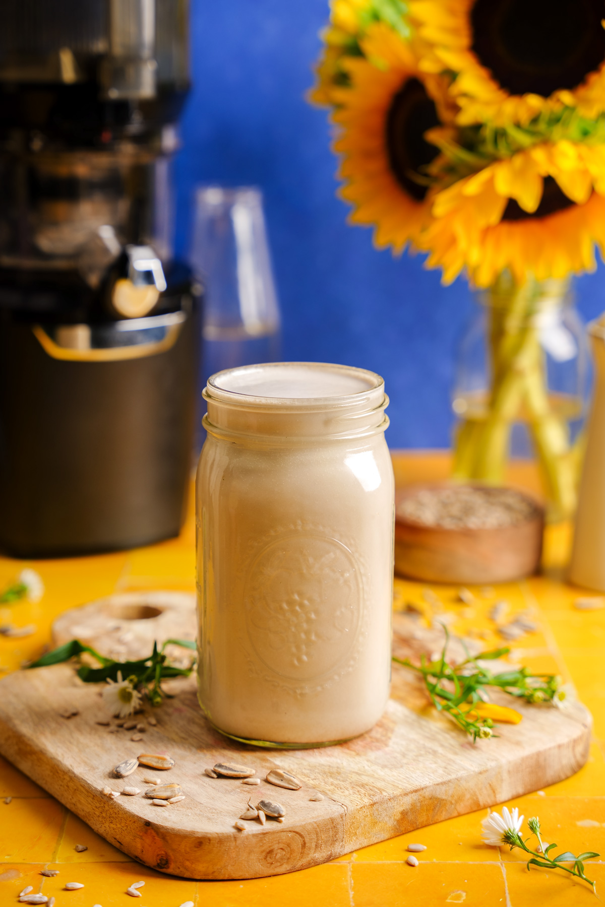 the homemade sunflower seed milk next to the kuvings auto10plus juicer