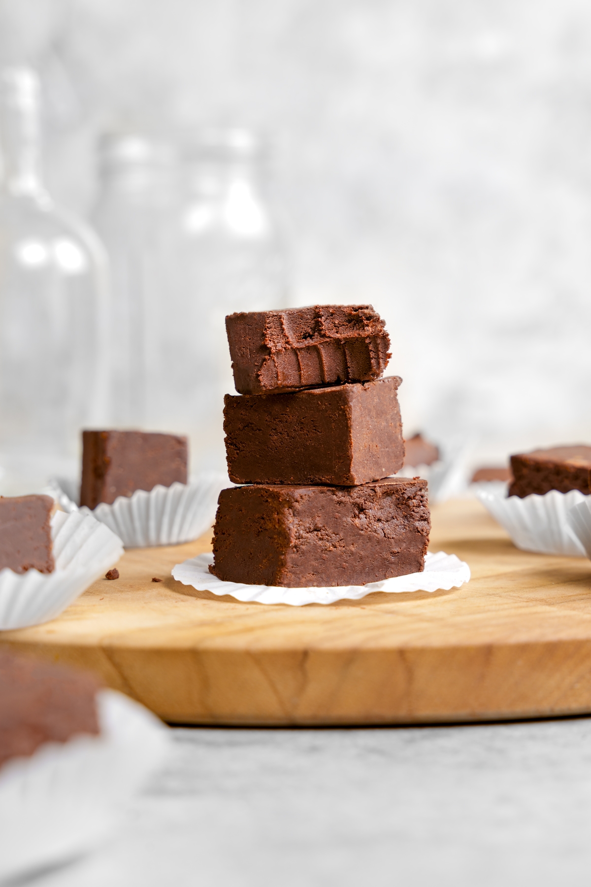 the protein fudge stacked on top of each other with a bite taken out of the top piece