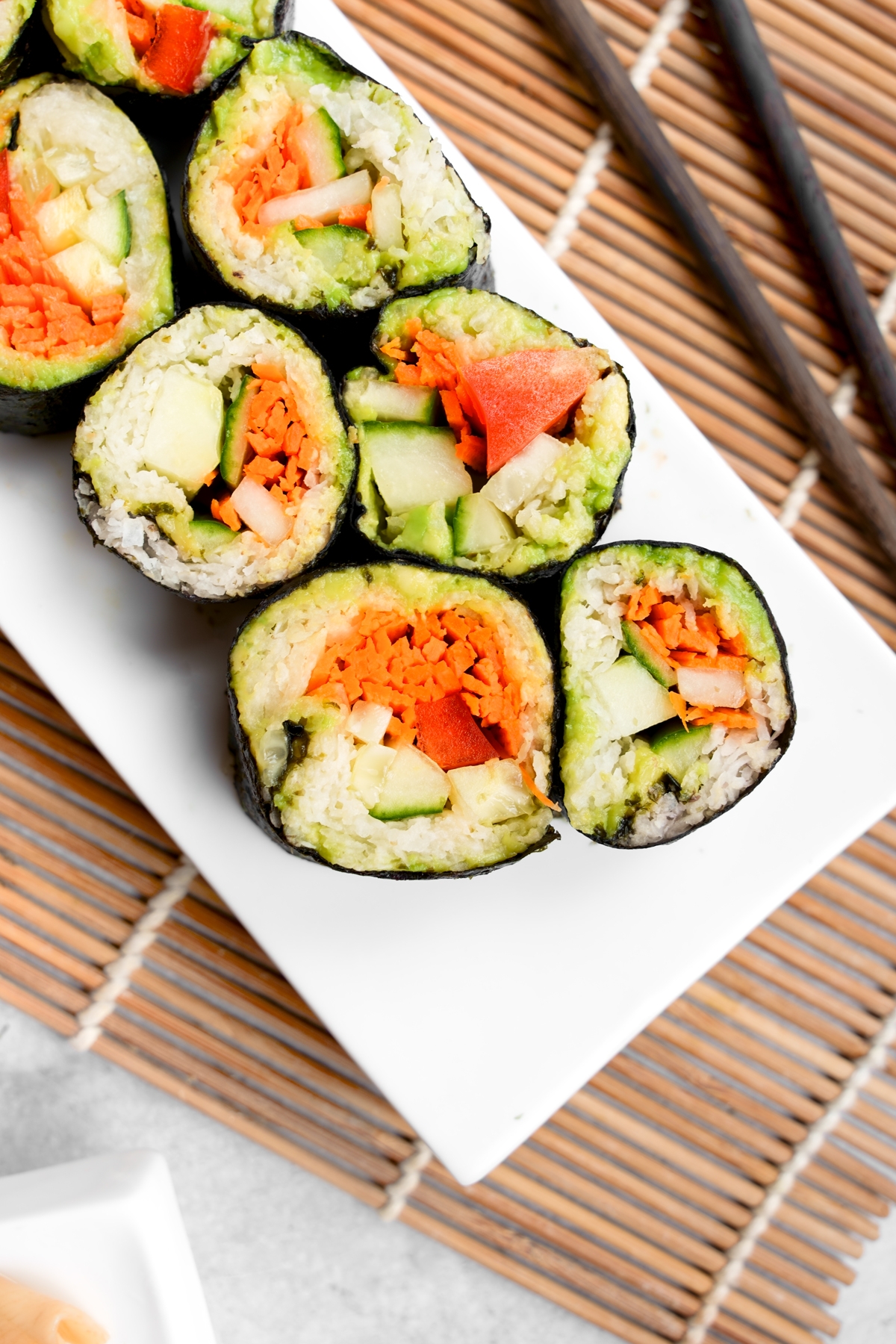 looking down at the raw vegan sushi to show the texture of the riced jicama