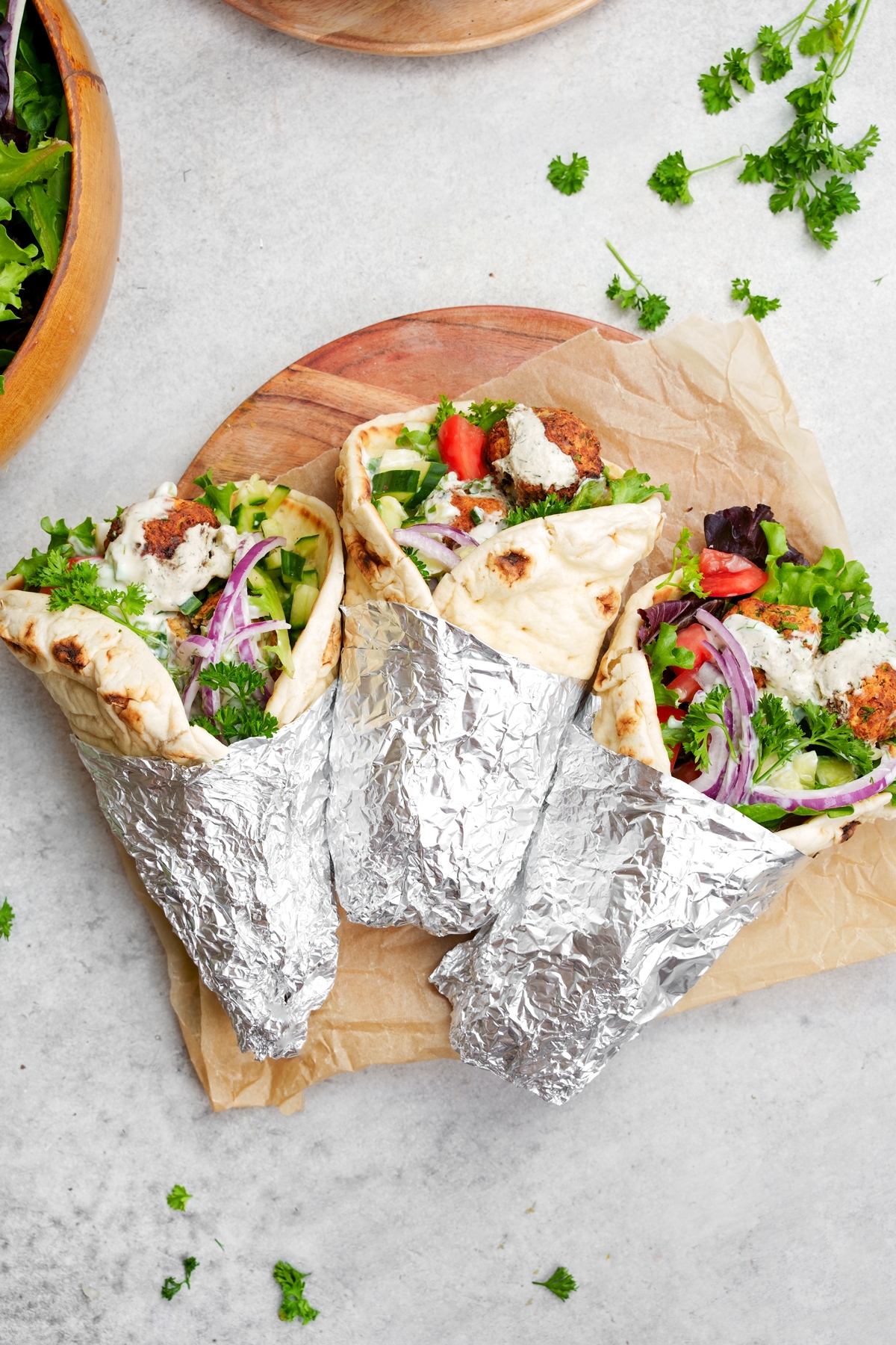 looking down at the wrapped oil-free falafel gyro