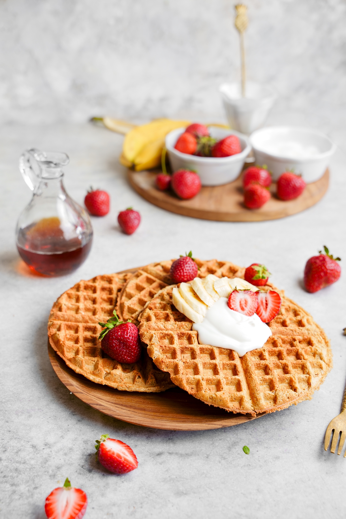 the vegan protein waffles with the vegan yogurt, strawberries, and banana toppings