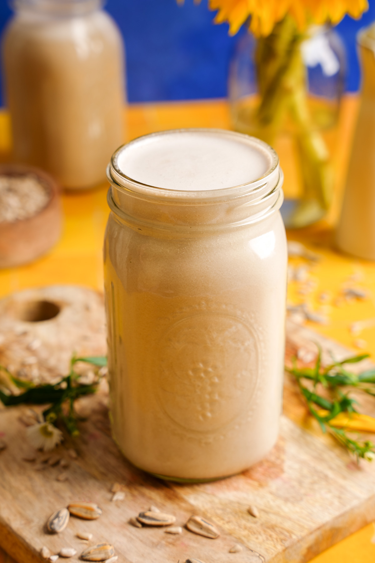 a close up of the creamy sunflower seed milk to show the smooth texture