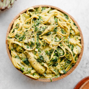 vegan spinach and artichoke pasta featured image