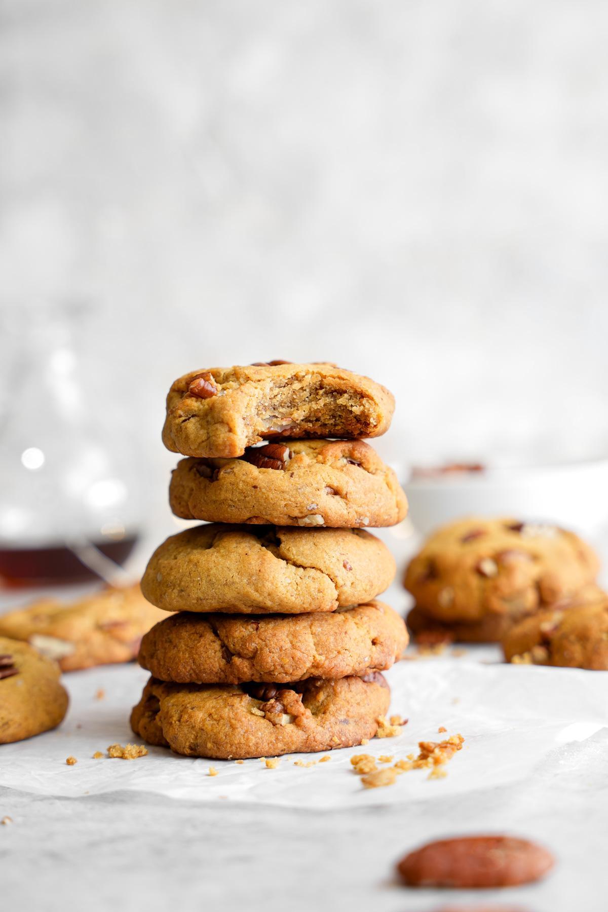 the maple pecan cookies stacked on top of each other with