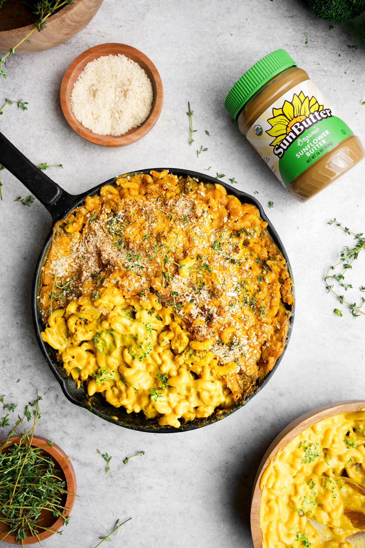 the nut free vegan mac and cheese with the sunbutter container and fresh thyme