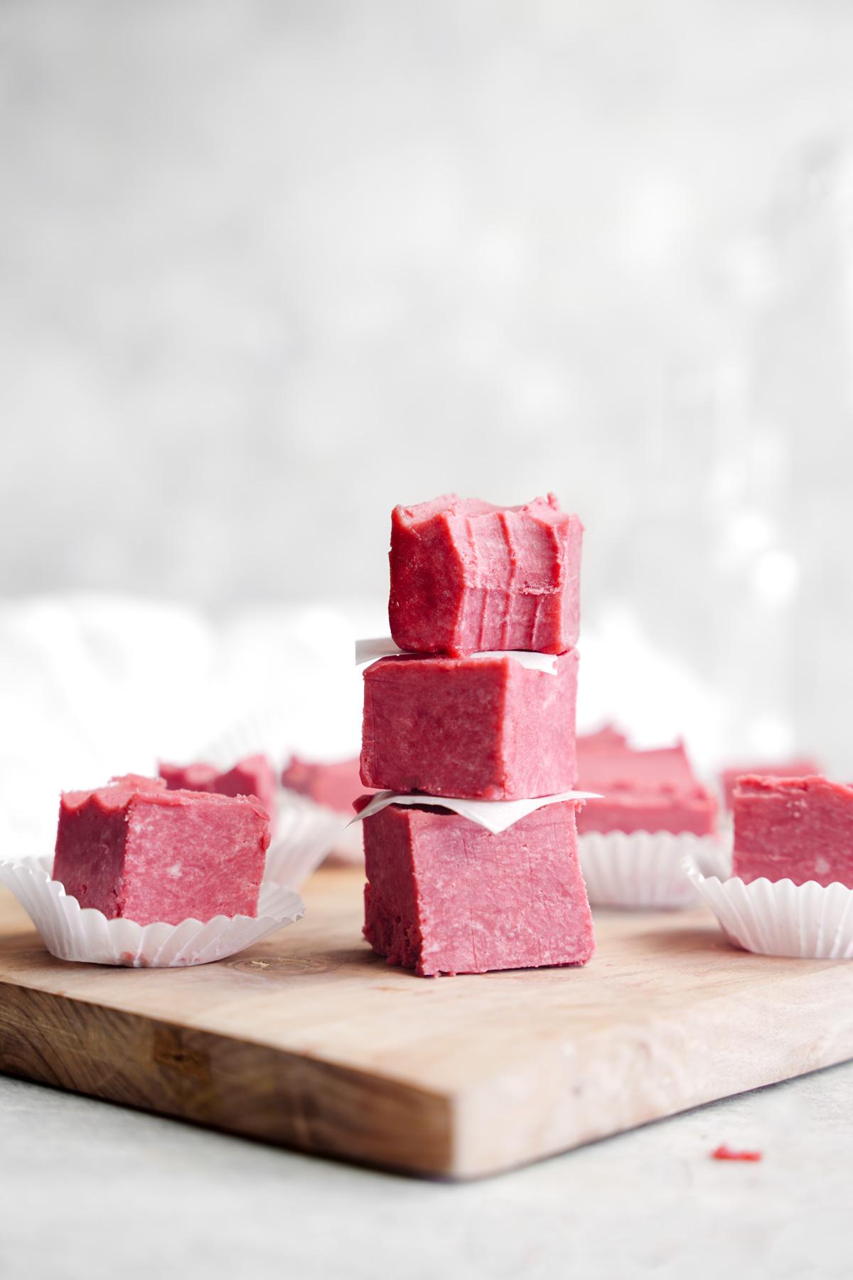 the vegan red velvet fudge stacked on top of each other
