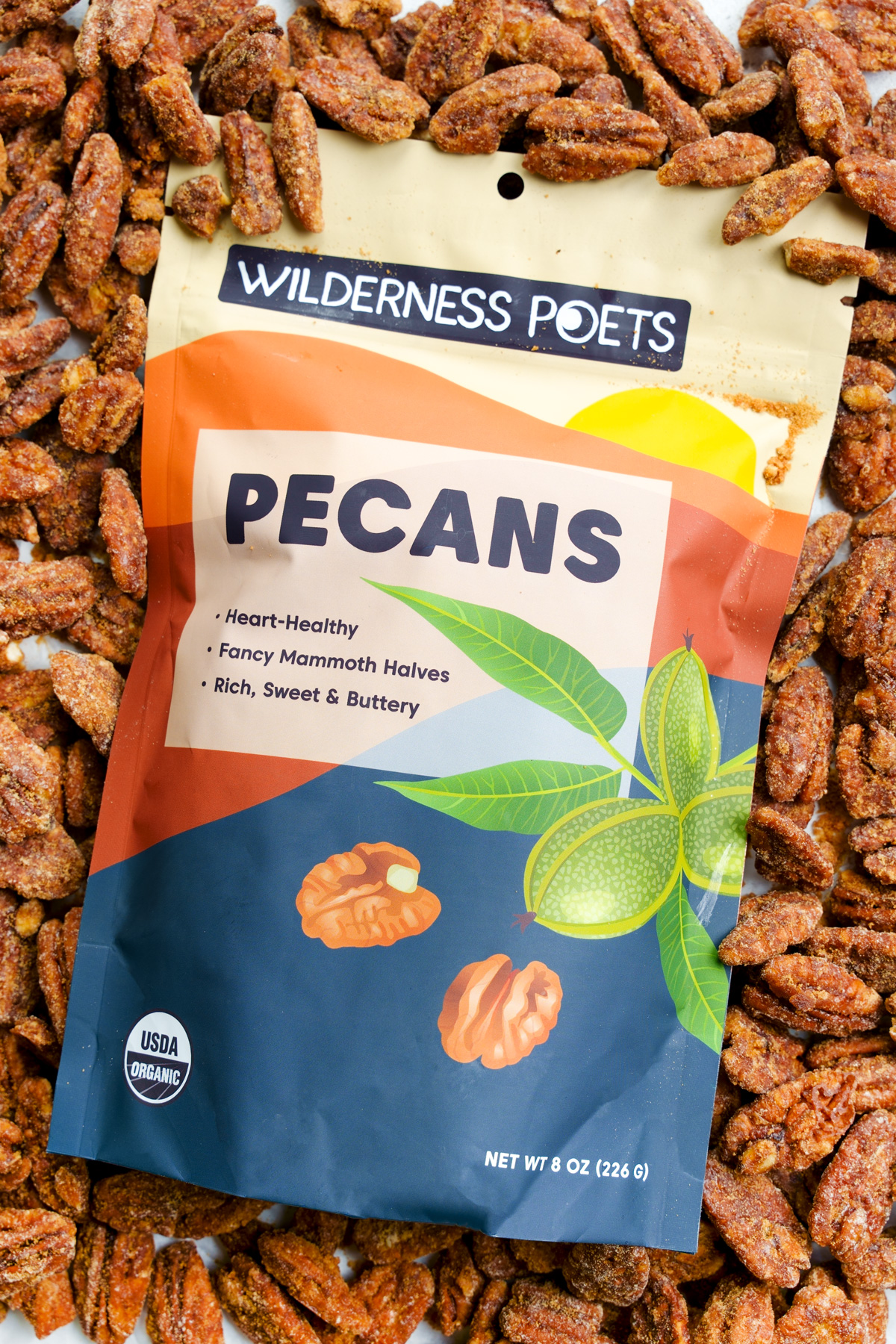 the healthy candied pecans with the wilderness poets raw pecan bag