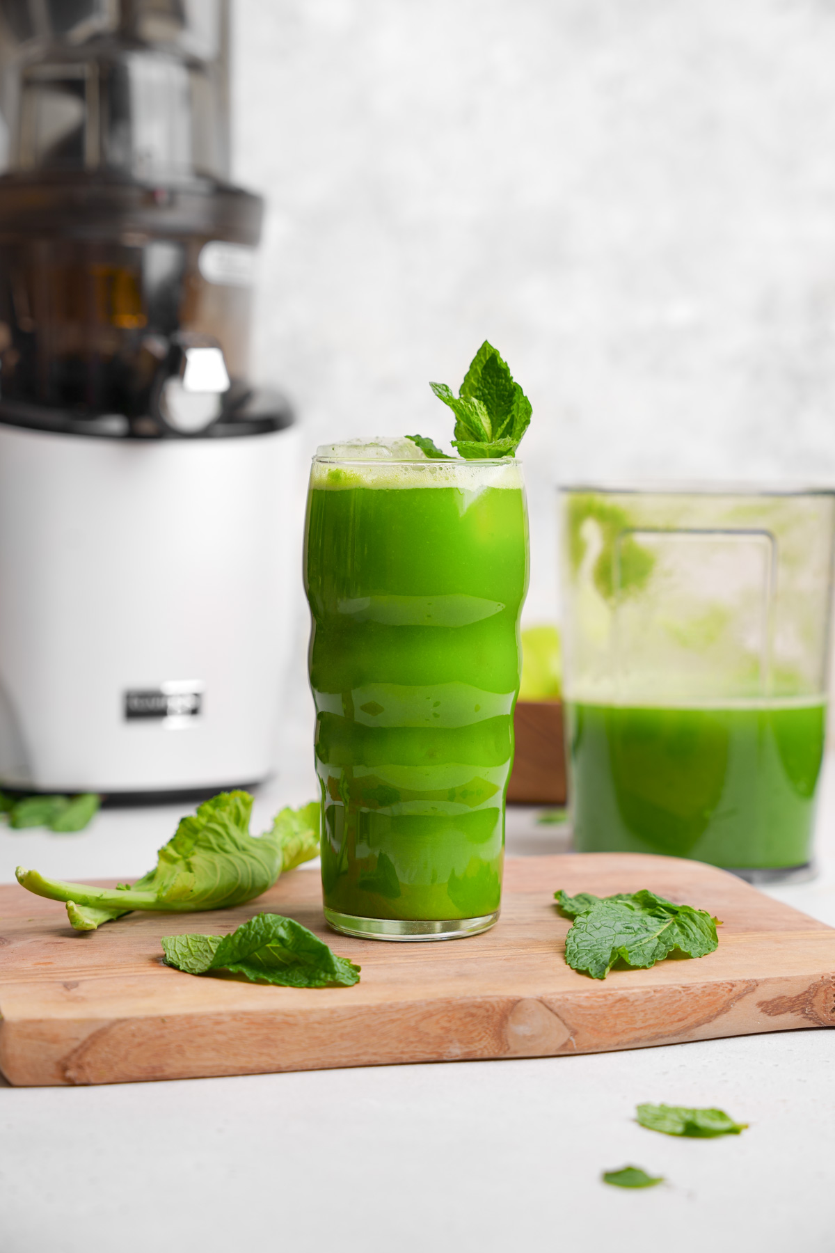the collard green juice with the kuvings juicer in the back
