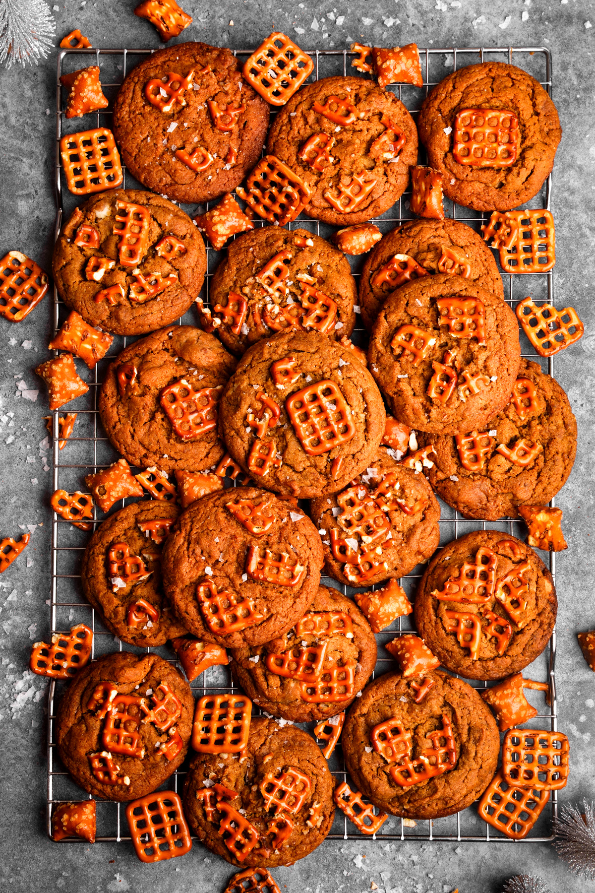 looking down at the peanut butter pretzel cookies on a wire rack