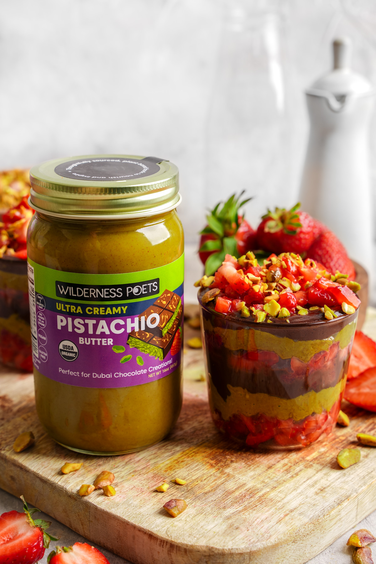 the dubai chocolate strawberries next to the wilderness poets pistachio butter