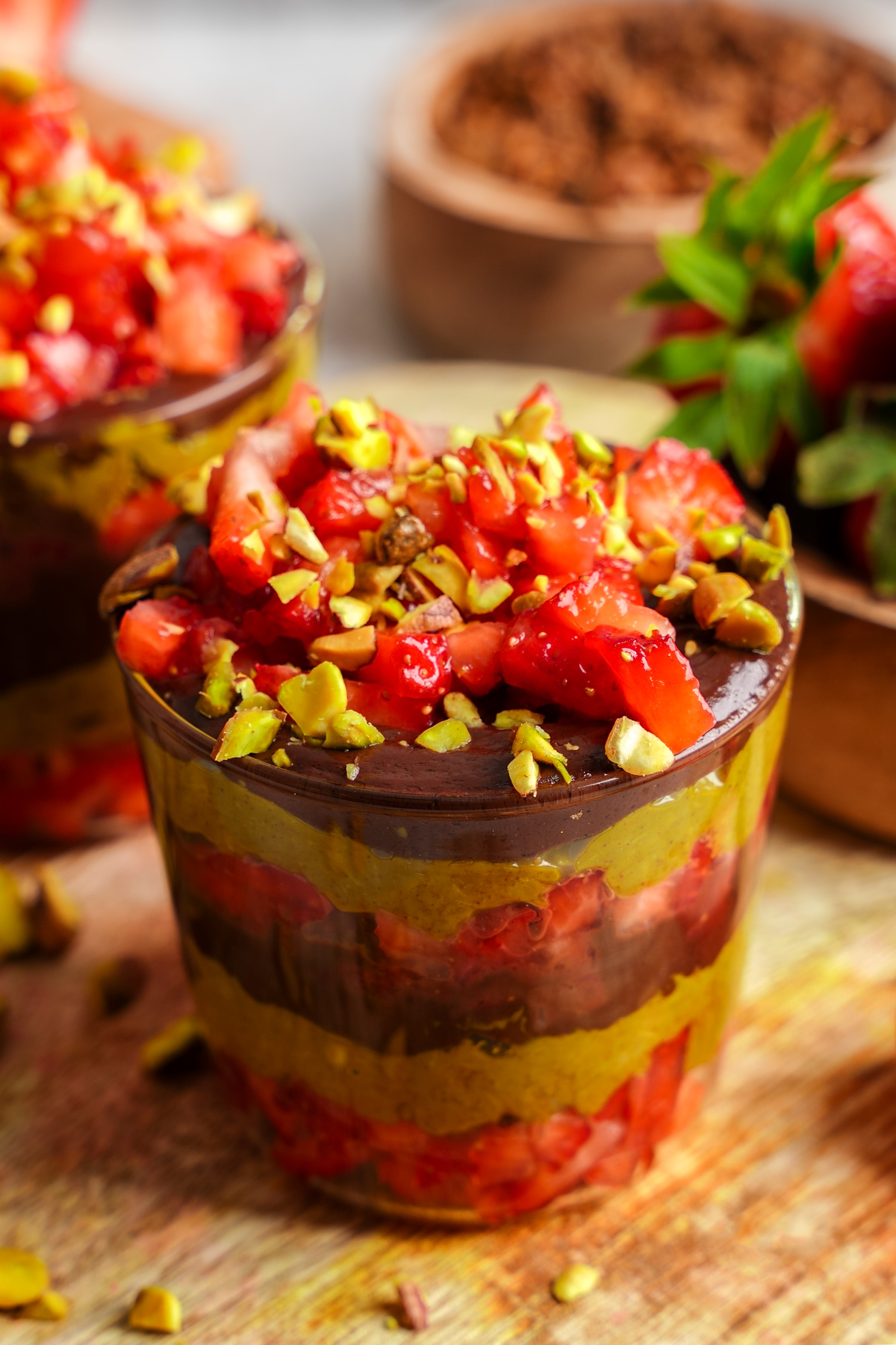 a close up of the dubai chocolate strawberries to show the textures of the pistachios and strawberries