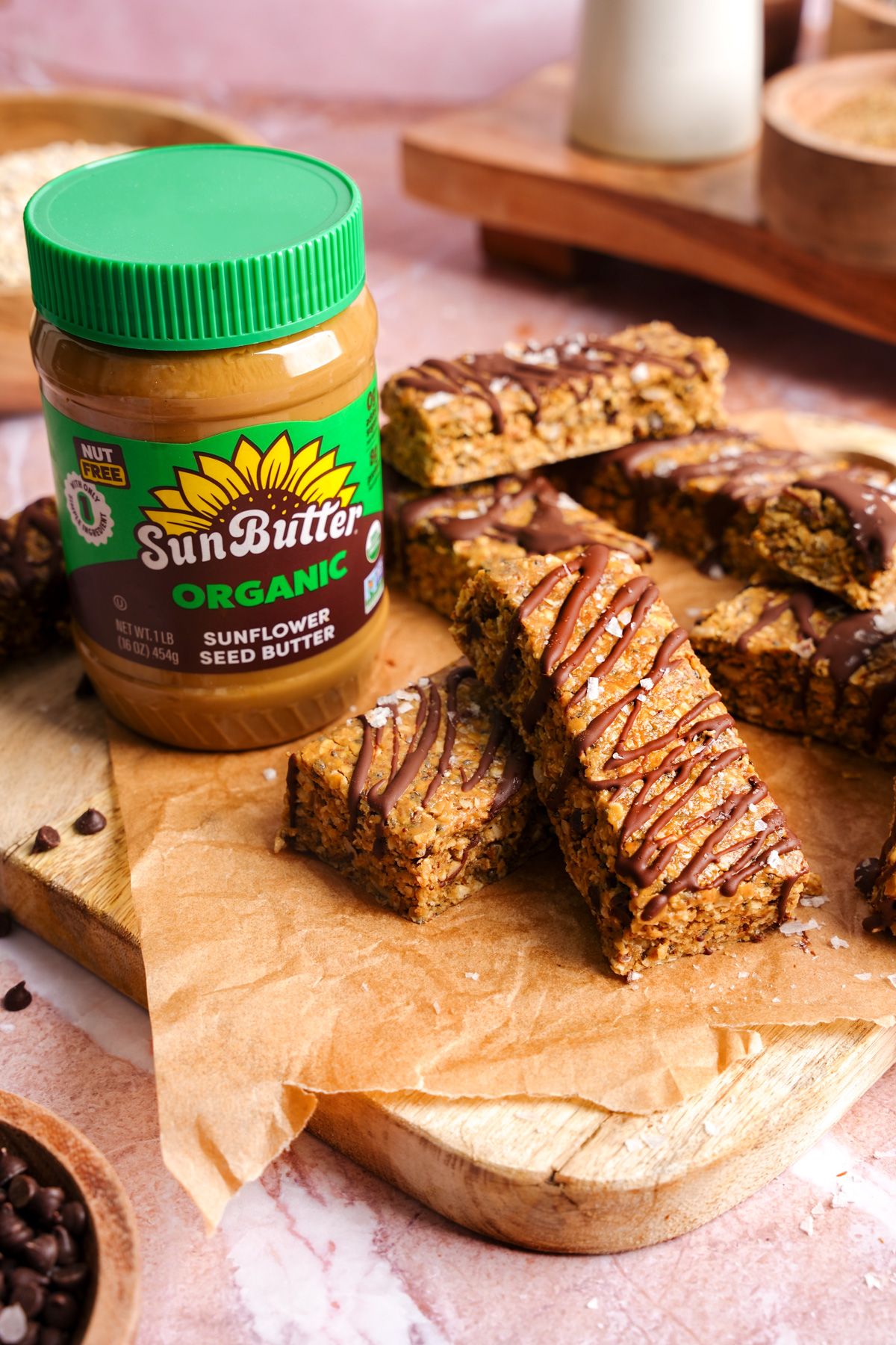 the homemade gluten-free and vegan protein bars next to the organic sunflower seed butter