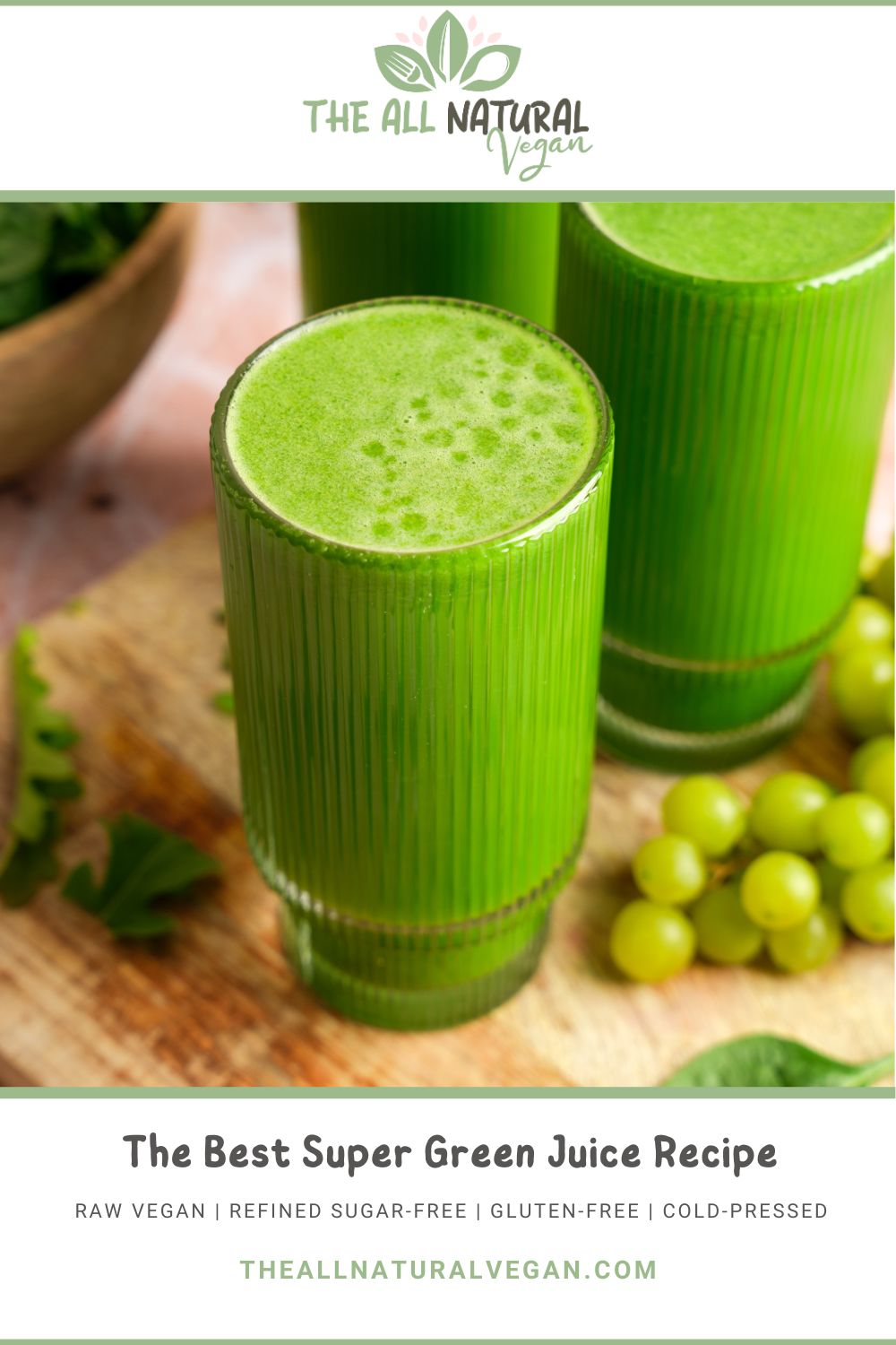 Promotional graphic for a raw vegan green juice recipe featuring a tall glass of vibrant green juice, surrounded by fresh green grapes and leafy greens, labeled “The Best Super Green Juice Recipe” from The All Natural Vegan.