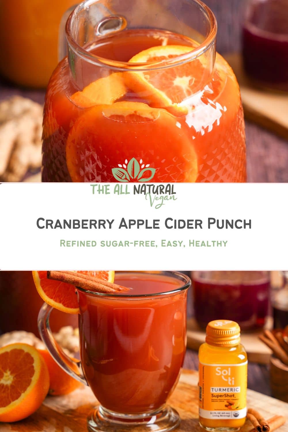 A cozy autumn beverage scene featuring a glass pitcher of cranberry apple cider punch with orange slices and a mug of the punch garnished with a cinnamon stick and orange slice. The setup includes a Sol-ti Turmeric SuperShot, fresh oranges, and warm lighting, highlighting this refined sugar-free, healthy seasonal drink.