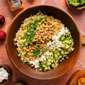 featured image of the vegan pasta salad with all the ingredients on top