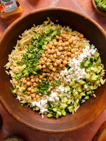 featured image of the vegan pasta salad with all the ingredients on top
